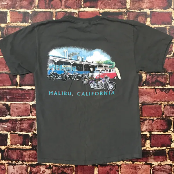 A t-shirt with an image of a bus on it.